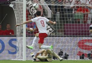 Poland's Robert Lewandowski opens the scoring at Euro 2012